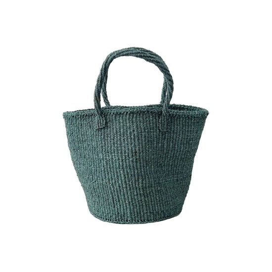 Woven teal basket on a white surface with a light gray background