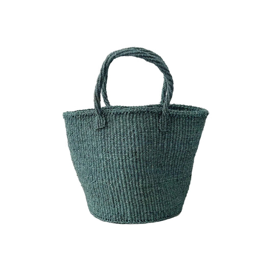 Woven teal basket on a white surface with a light gray background