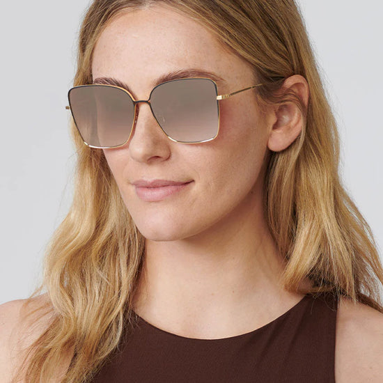 dolly matte black fade 24ki mirrored. Sunglasses. Krewe eyewear. Designer sunglasses. New orleans. Polarized. UV protection. UVA/UVB. Fashion sunglasses. Prescription. Sunglasses for men. Sunglasses for women. Retro sunglasses. Aviators. Wayfarer. Cat-eye sunglasses. Oversized sunglasses. Mirrored sunglasses. Trendy. Stylish. Luxury sunglasses.