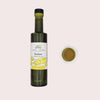 Bottle of Finch + Ferned butter infused olive oil on a light gray background