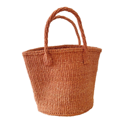 Brown woven basket with handles on a white background